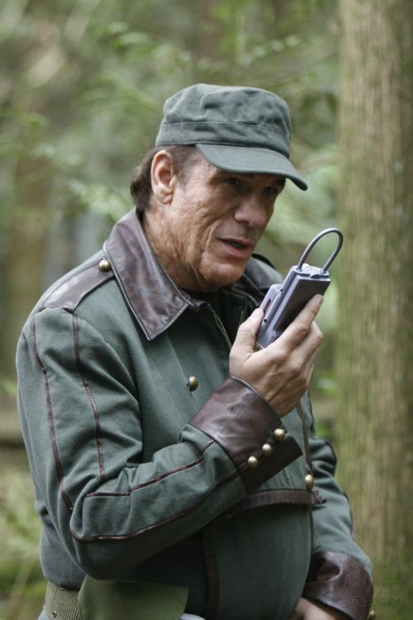 Acastus Kolya (Robert Davi), formerly a cutthroat commander in the Genii military.
