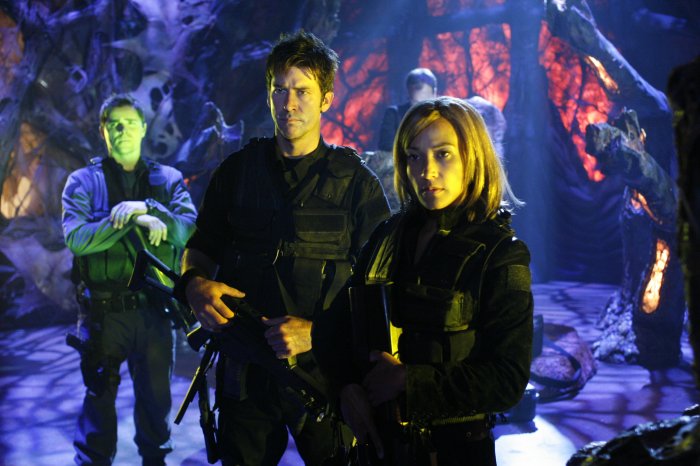 Lt. Colonel John Sheppard (Joe Flanigan), Teyla Emmagan (Rachel Luttrell), and Major Lorne (Kavan Smith) on board a Wraith hive ship
